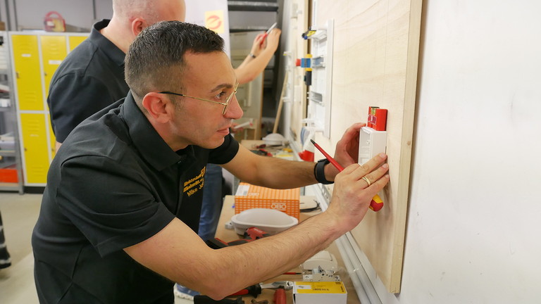 Oberbürgermeister im Handwerkskittel